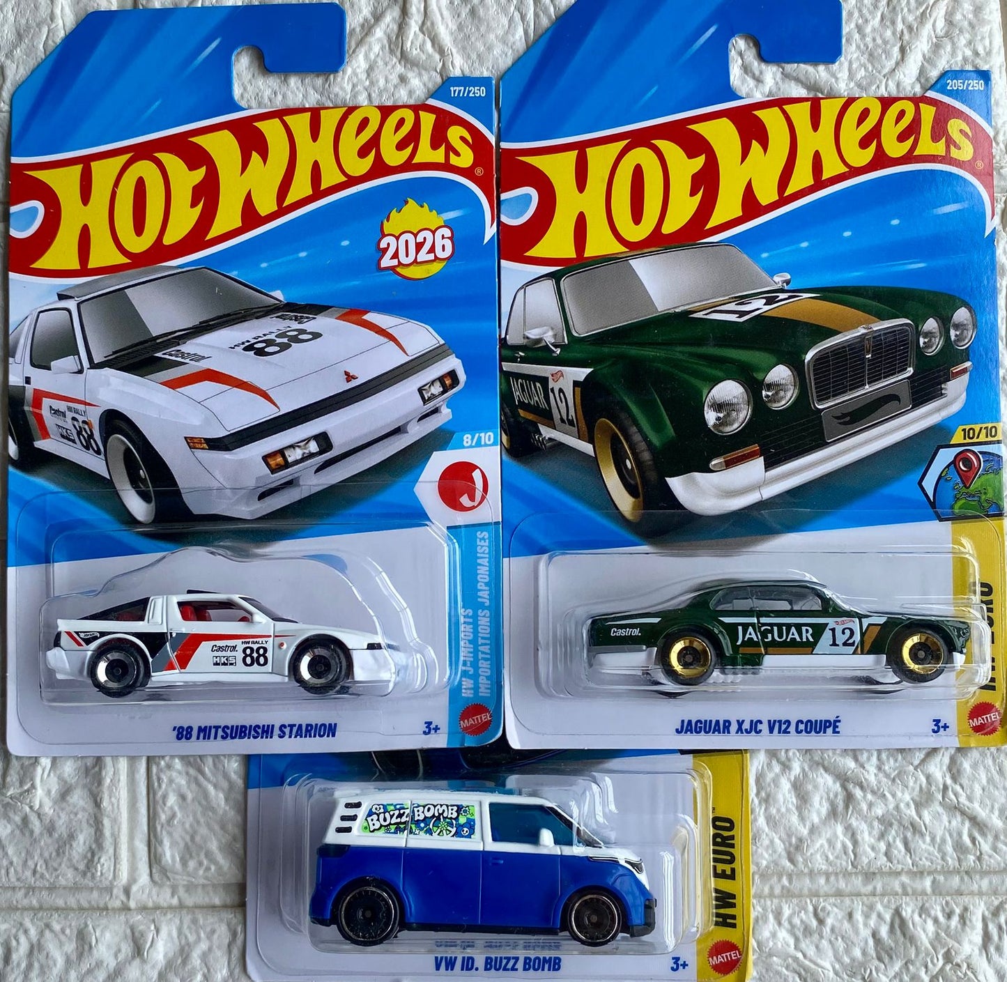 PACK OF 3 - 88 MITSUBISHI STARION, 12 JAGUAR XJC V12 COUPÉ and VW ID. BUZZ BOMB